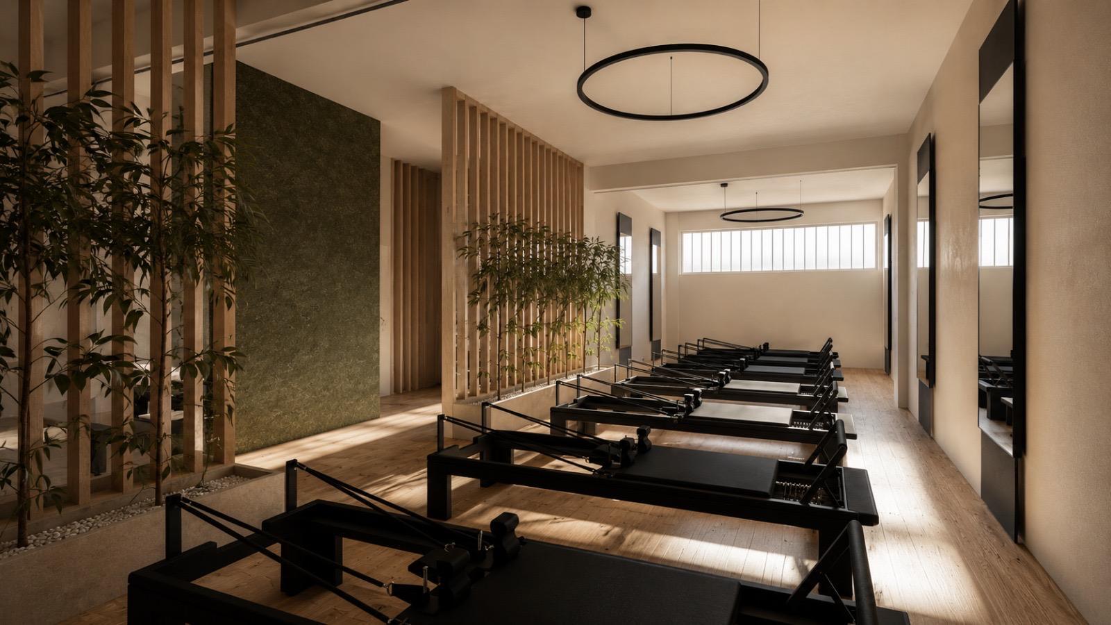 Imagem 3D da sala principal com aparelhos Reformer do BLIVE Pilates Alvalade